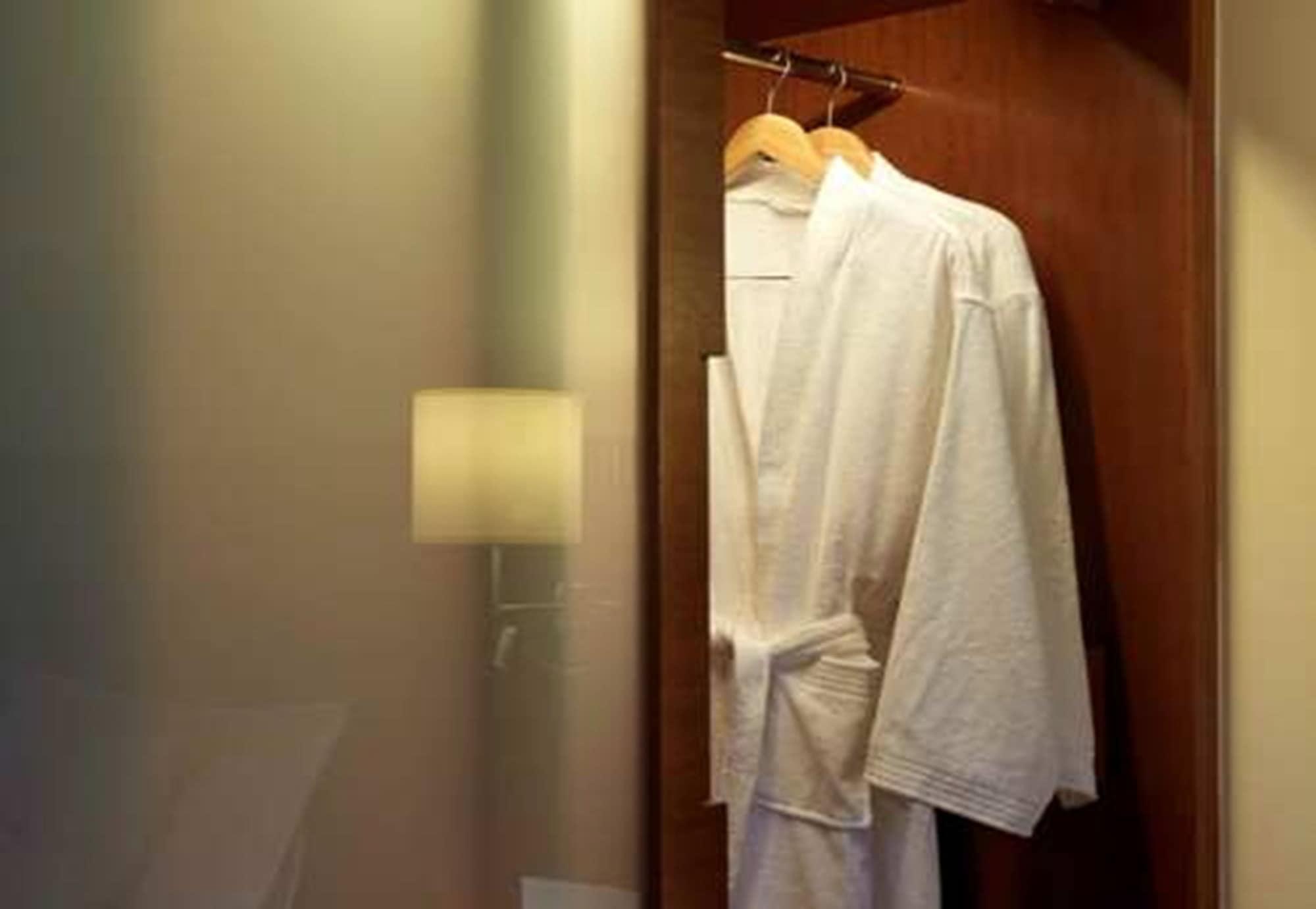 One World Hotel Petaling Jaya Εξωτερικό φωτογραφία A bathrobe hanging on a door